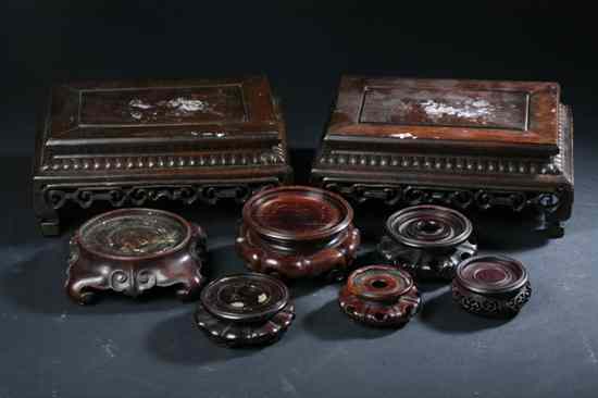 Appraisal: PAIR CHINESE ROSEWOOD RECTANGULAR STANDS Together with six circular stands