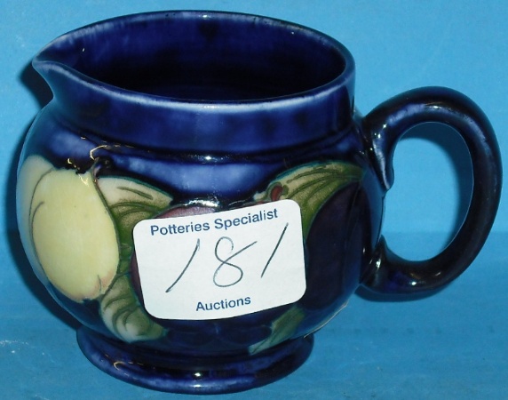 Appraisal: Moorcroft small Jug decorated in the Wisteria design height cm