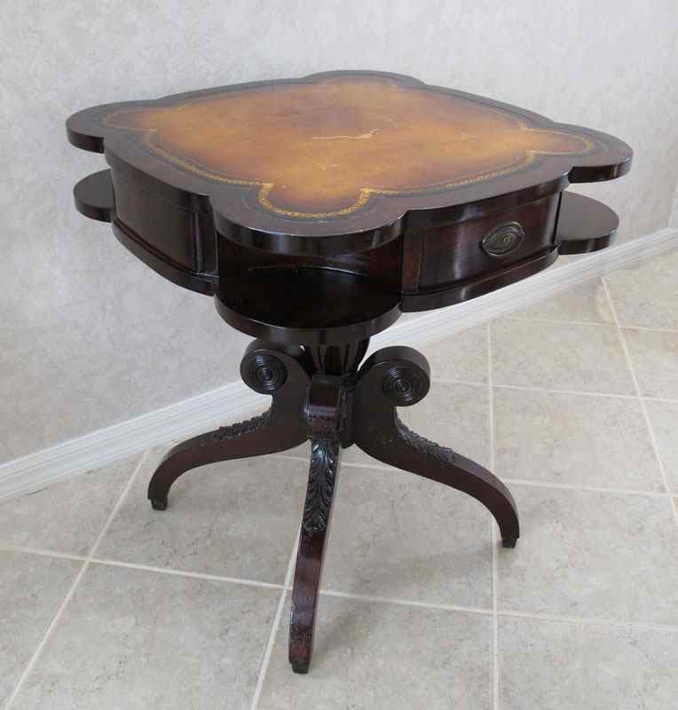 Appraisal: MAHOGANY SPIDER LEG PARLOR TABLE Leather inset top with gilt