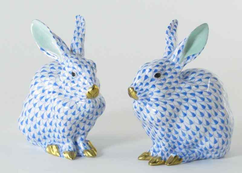 Appraisal: Pair of Resting Herend Rabbitshand painted blue fishnet motif sitting