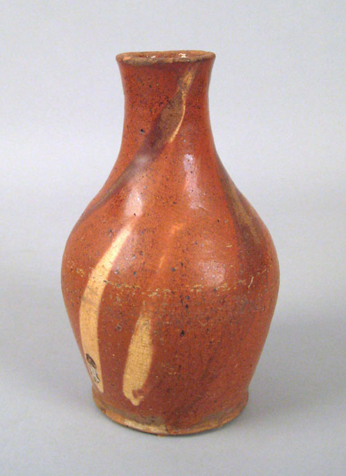 Appraisal: American redware bottle th c with yellow slip decoration h