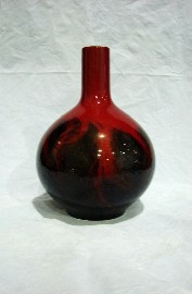 Appraisal: A Royal Doulton Flambe Veined experimental vase with dimpled textured