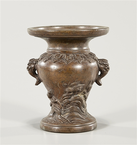 Appraisal: Chinese bronze urn with beast-head handles and birds and waves