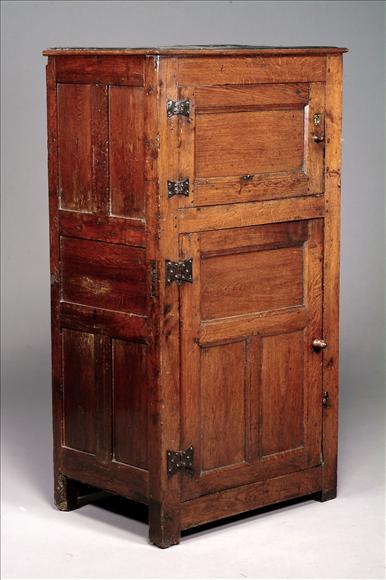 Appraisal: An oak cupboard first half th century the field panelled