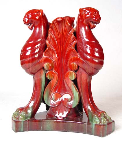 Appraisal: FLAMBE MAJOLICA FIGURAL LIONS HEAD TABLE BASE UMBRELLA STAND ''