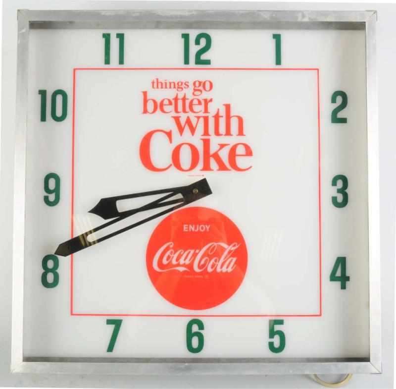 Appraisal: Coca-Cola Electric Lighted Clock s Clean and bright plastic face