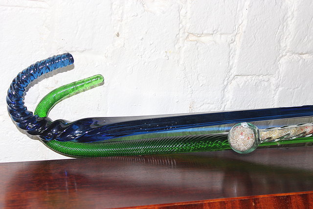 Appraisal: A NAILSEA TYPE GREEN GLASS WALKING CANE together with a