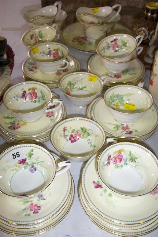 Appraisal: A collection of Royal Worcester pale yellow ground teawares with