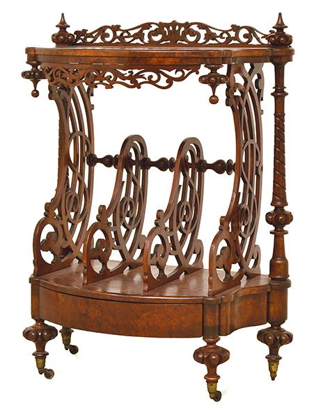 Appraisal: A VICTORIAN BURR WALNUT MUSIC CANTERBURY With a shaped gallery