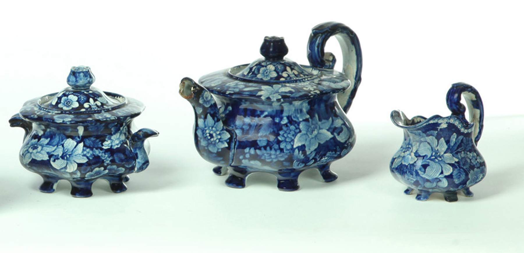 Appraisal: THREE-PIECE HISTORICAL BLUE STAFFORDSHIRE TEA SET England nd quarter- th