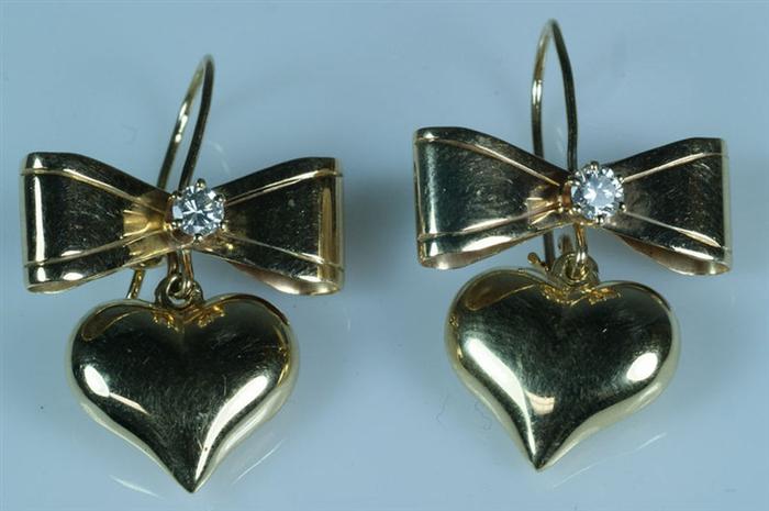 Appraisal: Pr unmarked K YG heart and bow earrings each with