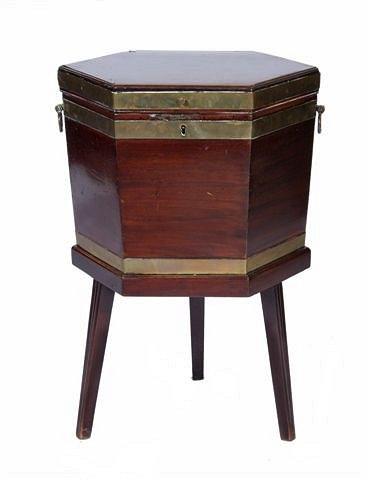 Appraisal: A GEORGE III MAHOGANY AND BRASS BOUND HEXAGONAL WINE COOLER