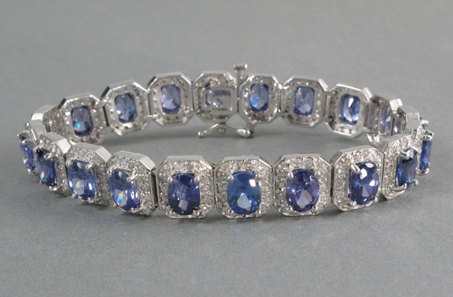 Appraisal: TANZANITE AND DIAMOND BRACELET The k white gold bracelet is