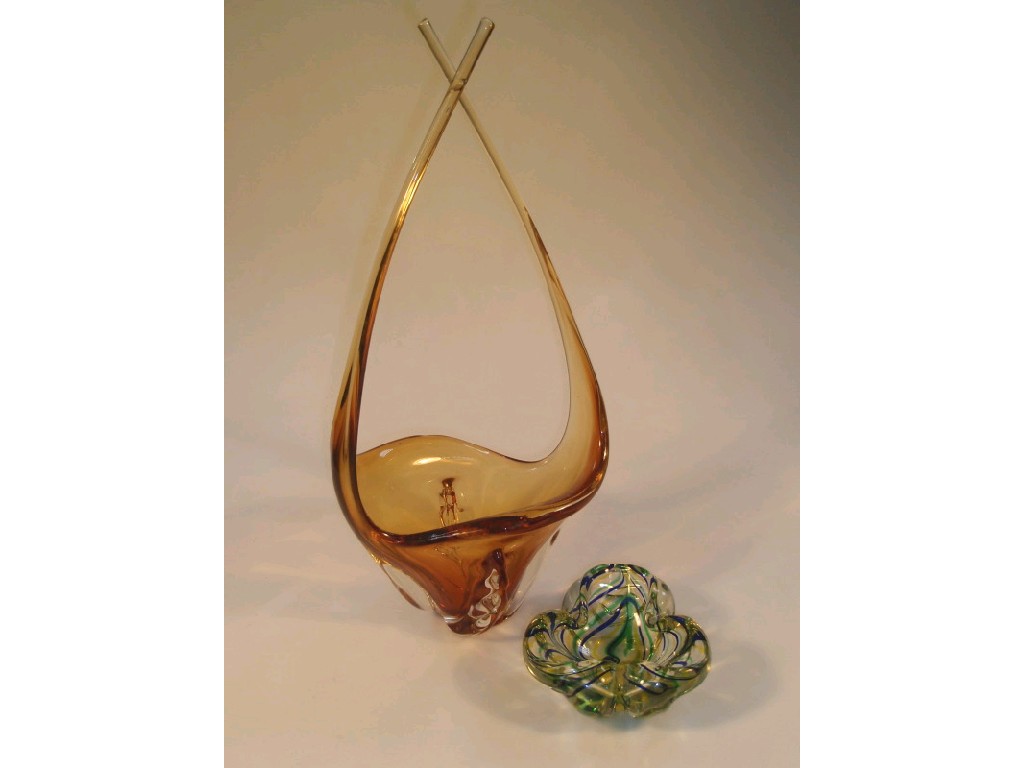 Appraisal: An amber glass basket vase the moulded body with extending