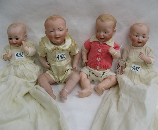 Appraisal: FOUR GERMAN BISQUE HEAD CHARACTER BABIES twin babies H molded