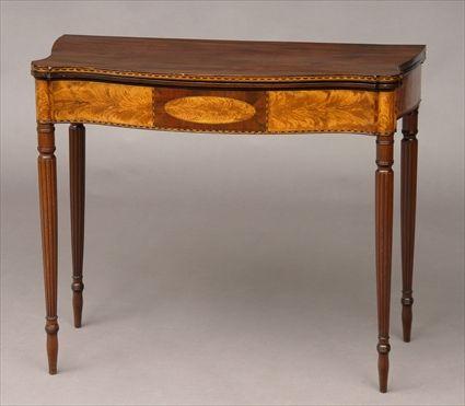 Appraisal: MASSACHUSETTS BIRCH INLAID MAHOGANY GAMES TABLE The serpentine-fronted folding top