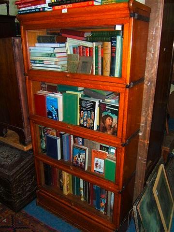 Appraisal: An oak four section Globe-Wernicke bookcase high