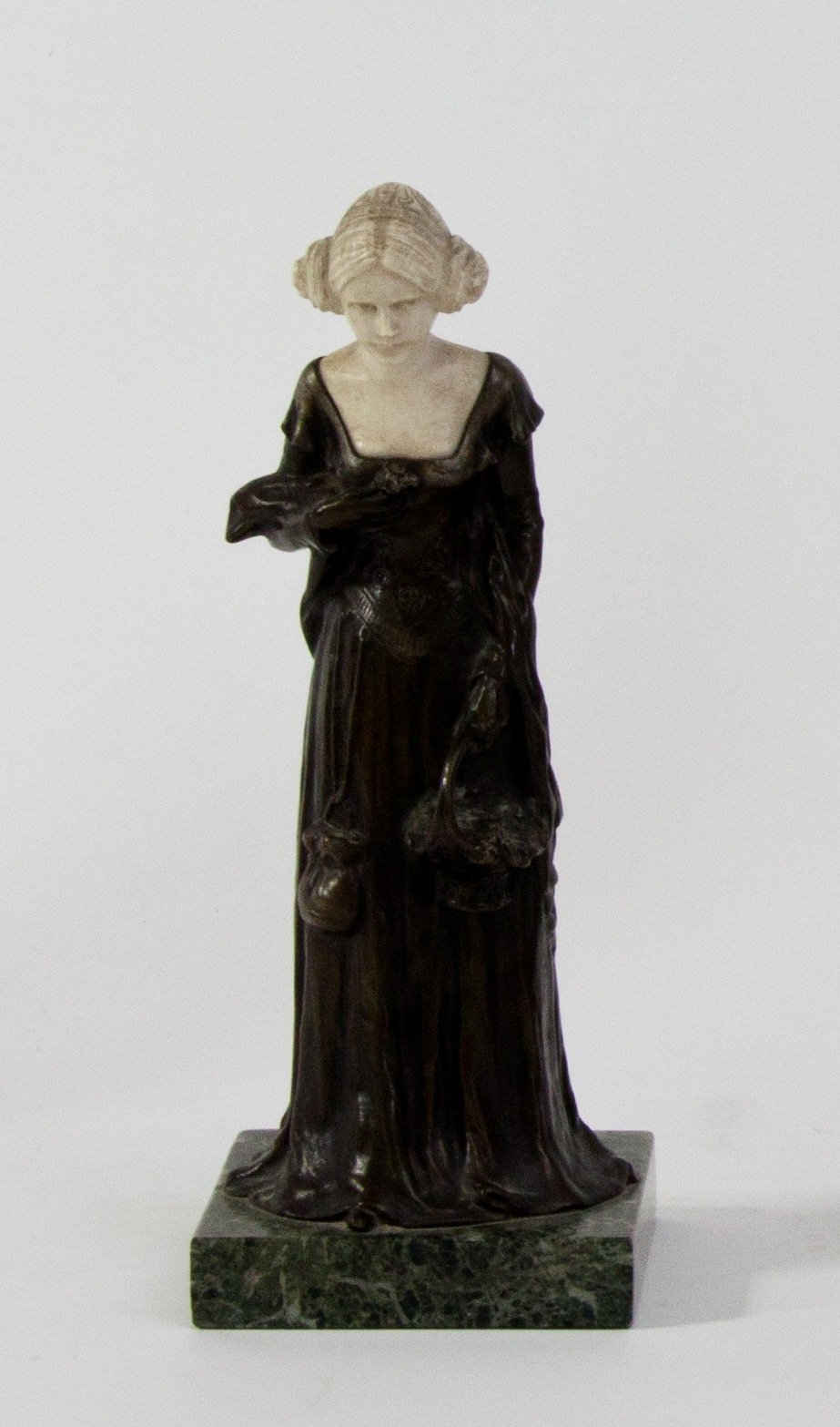 Appraisal: After Ferdinand Lugerth Figure of a Lady with Basket of