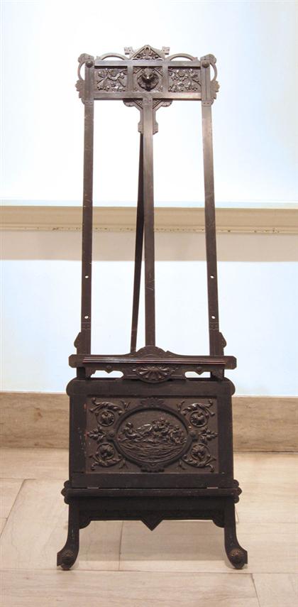 Appraisal: Ebonized carved Eastlake easel new york circa The shaped top