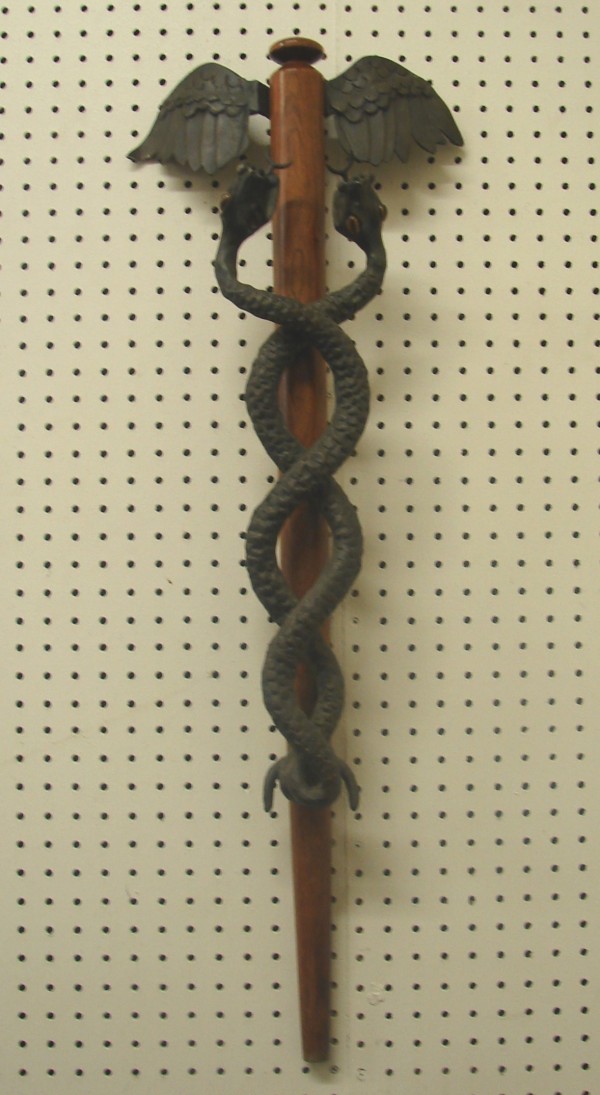 Appraisal: CADUCEUS bronze and wood t signed and dated