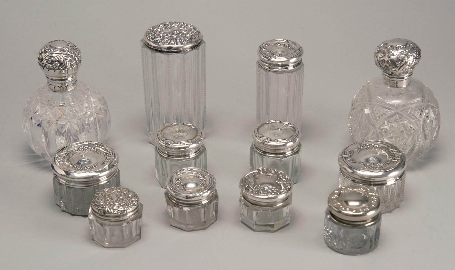 Appraisal: TWELVE STERLING SILVER AND GLASS DRESSER ITEMS by various makers