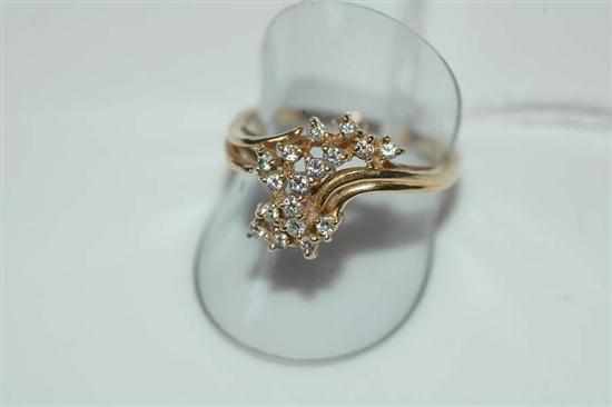 Appraisal: A DIAMOND CLUSTER DRESS RING STAMPED CT GOLD