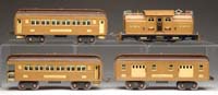 Appraisal: LIONEL STANDARD GAUGE E LOCOMOTIVE AND THREE MATCHING PASSENGER CARS