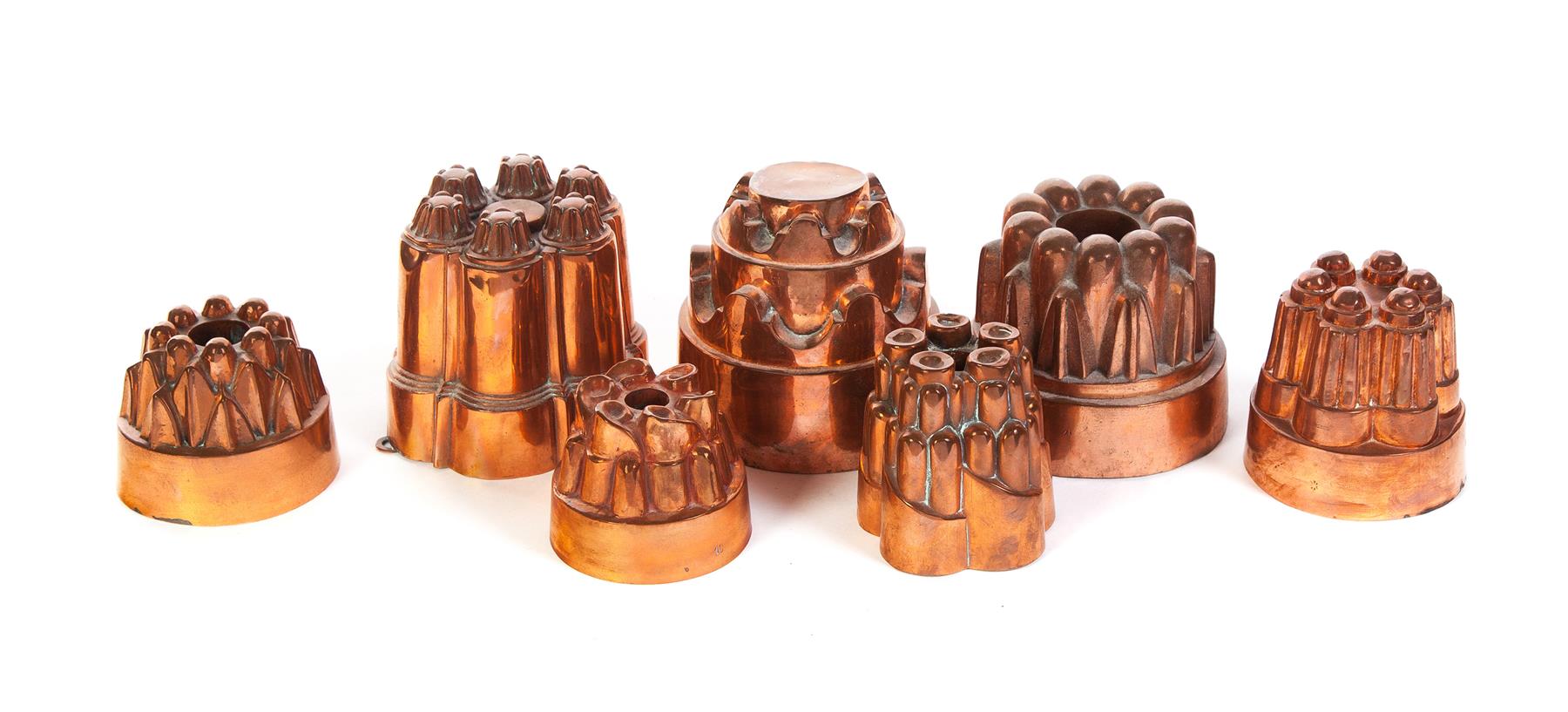 Appraisal: SEVEN ROUND COPPER FOOD MOLDS WITH TINNED LINERS European th