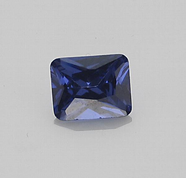 Appraisal: An unmounted tanzanite the rectangular-cut tanzanite weighing cts