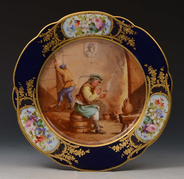 Appraisal: A SEVRES COBALT GROUND PORCELAIN CABINET PLATE decorated with a