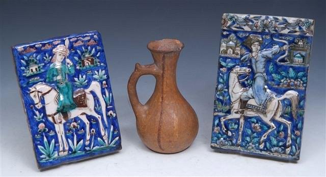 Appraisal: A PERSIAN BLUE GROUND TILE decorated huntsman on horse x