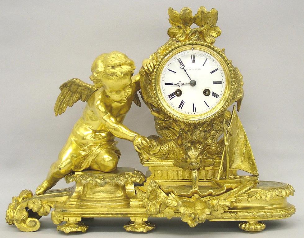 Appraisal: French ormolu two train figural mantel clock the movement stamped