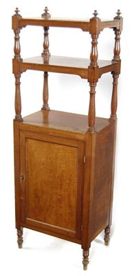 Appraisal: A Victorian mahogany whatnot with two tiers supported by baluster