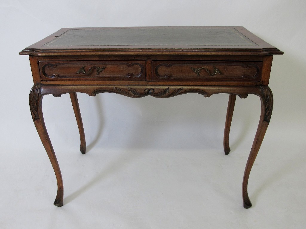 Appraisal: An early th century mahogany desk with green leather skiver