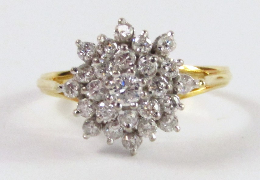 Appraisal: A triple row diamond cluster ring set in ct yellow