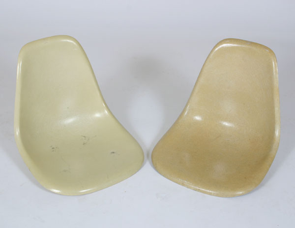 Appraisal: Two Eames for Herman Miller shell chairs Herman Miller Furniture