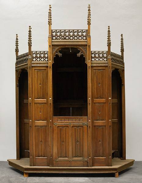 Appraisal: A French Gothic Revival oak confessional mid th century The