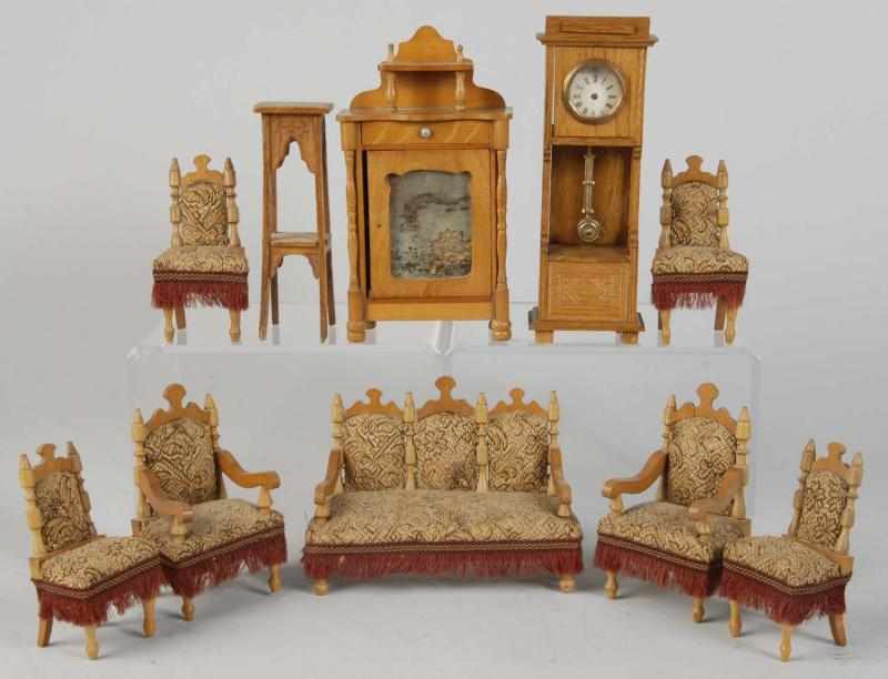 Appraisal: Set of Schneegas Golden Oak Doll House Furniture Description Seven-piece