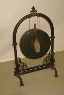 Appraisal: A VICTORIAN BRASS GONG the arched cast iron stand with