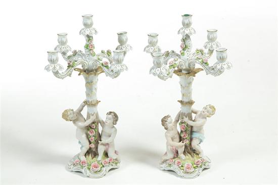 Appraisal: PAIR OF FIGURAL CANDELABRA France th century porcelain Three-part candelabra