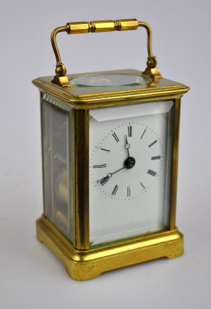 Appraisal: A late th century lacquered brass carriage clock the twin