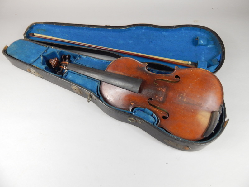 Appraisal: A Hawkes Son Concert violin with a two piece back