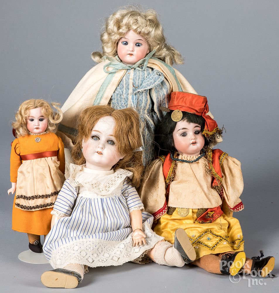 Appraisal: Four bisque head dolls Four bisque head dolls to include