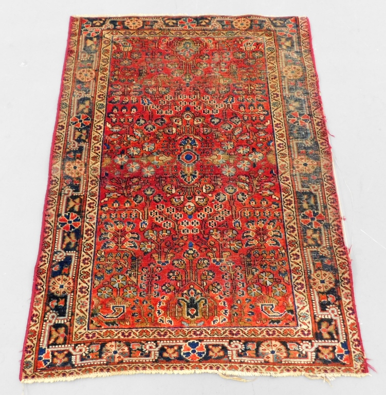 Appraisal: PERSIAN SAROUK RED RUG Middle East th CenturyGeometric floral pattern