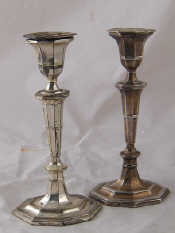 Appraisal: A pair of silver candlesticks of elongated octagonal section Adam