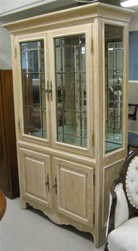 Appraisal: A CONTEMPORARY OAK AND LEADED GLASS DISPLAY CABINET Country Chippendale