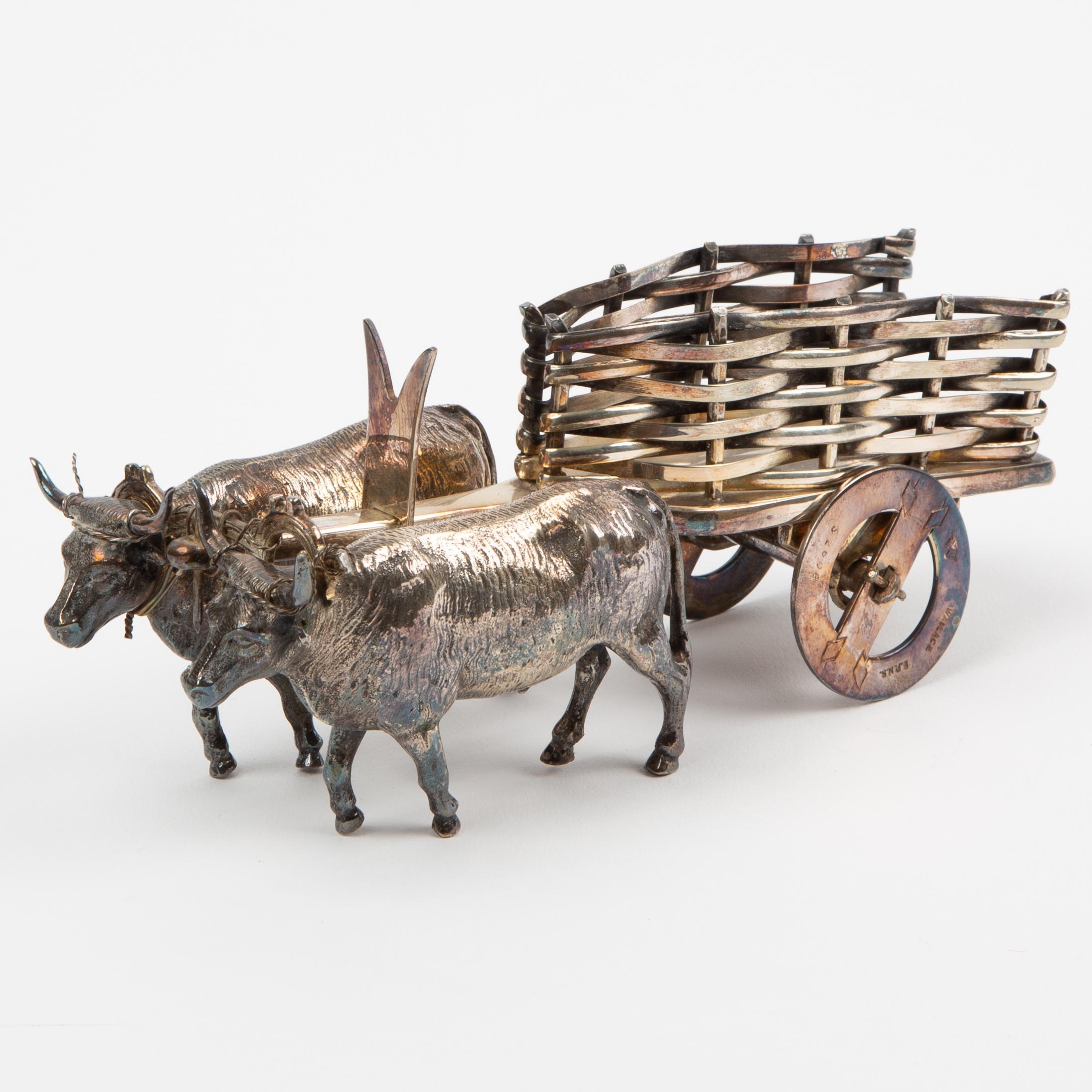 Appraisal: WALLACE SILVER PLATE OX CART A pair of vintage figural