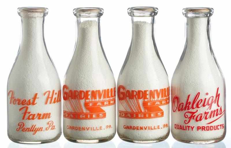 Appraisal: Lot of Pennsylvania Milk Bottles Description Lot includes two bottles