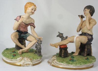 Appraisal: A Pair Signed capodimonte Figures children playing with animals