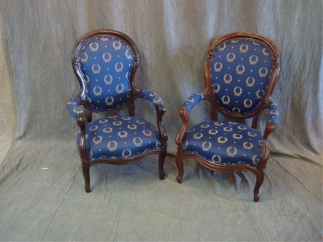 Appraisal: Victorian arm chairs w blue print upholstery From a Sleepy